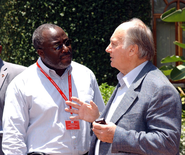 His Highness the Aga Khan speaking with Mr. Ali A. Mufuruki, Chairman